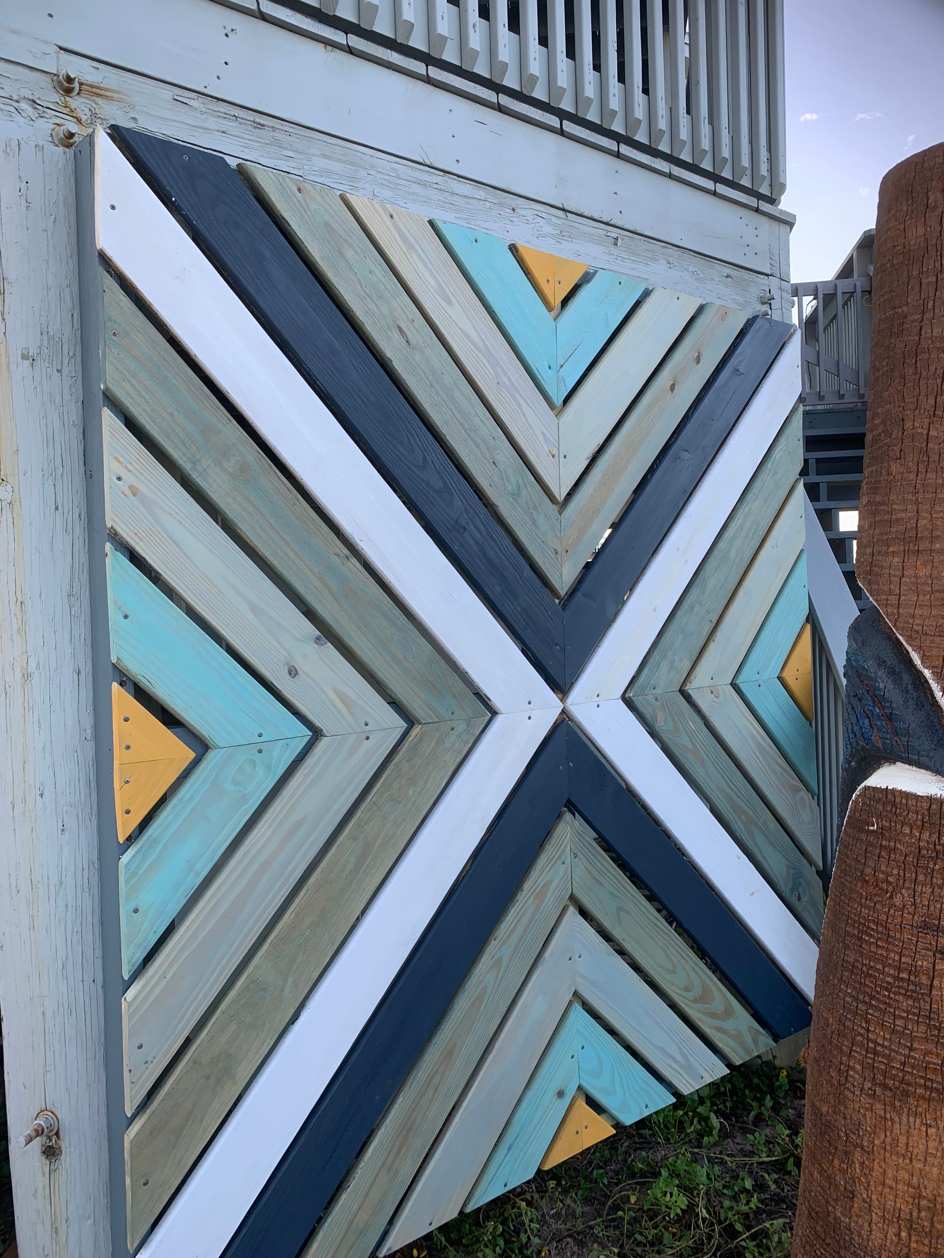 Geometric pattern CNC-cut barn doors, bespoke architectural millwork North Florida