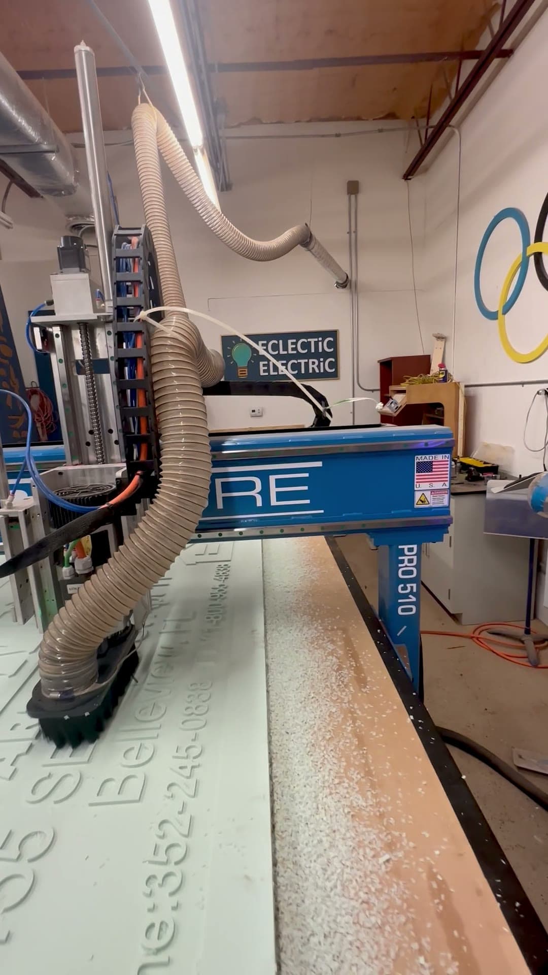 The CNC carving a dimensional feature piece in hardwood