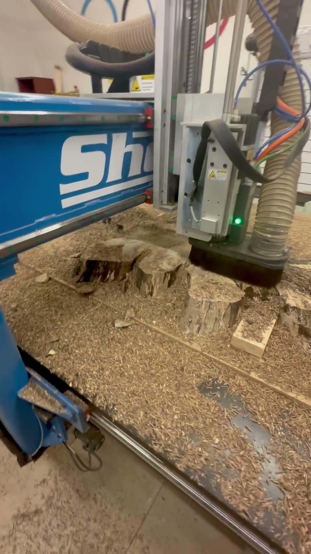 Close CNC pass revealing the grain pattern across a hardwood front