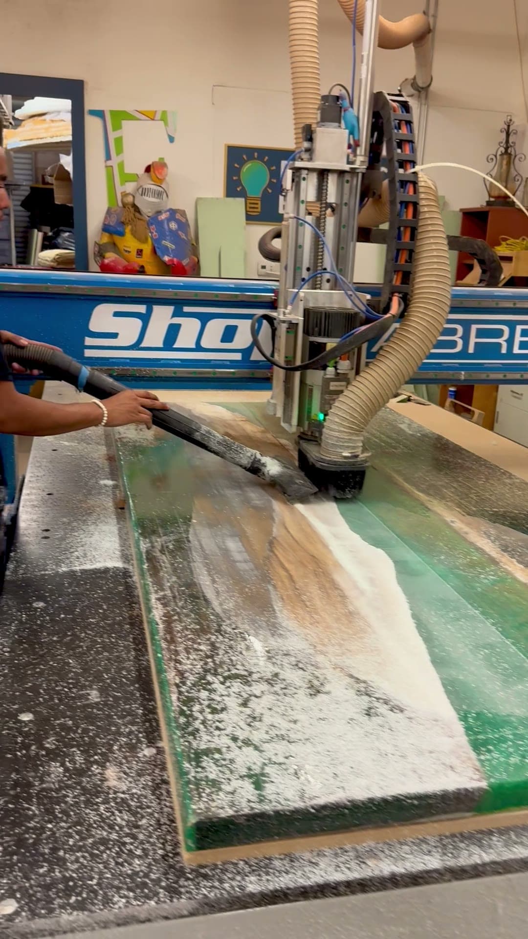Epoxy resin poured into a live-edge void and levelling out to a finish